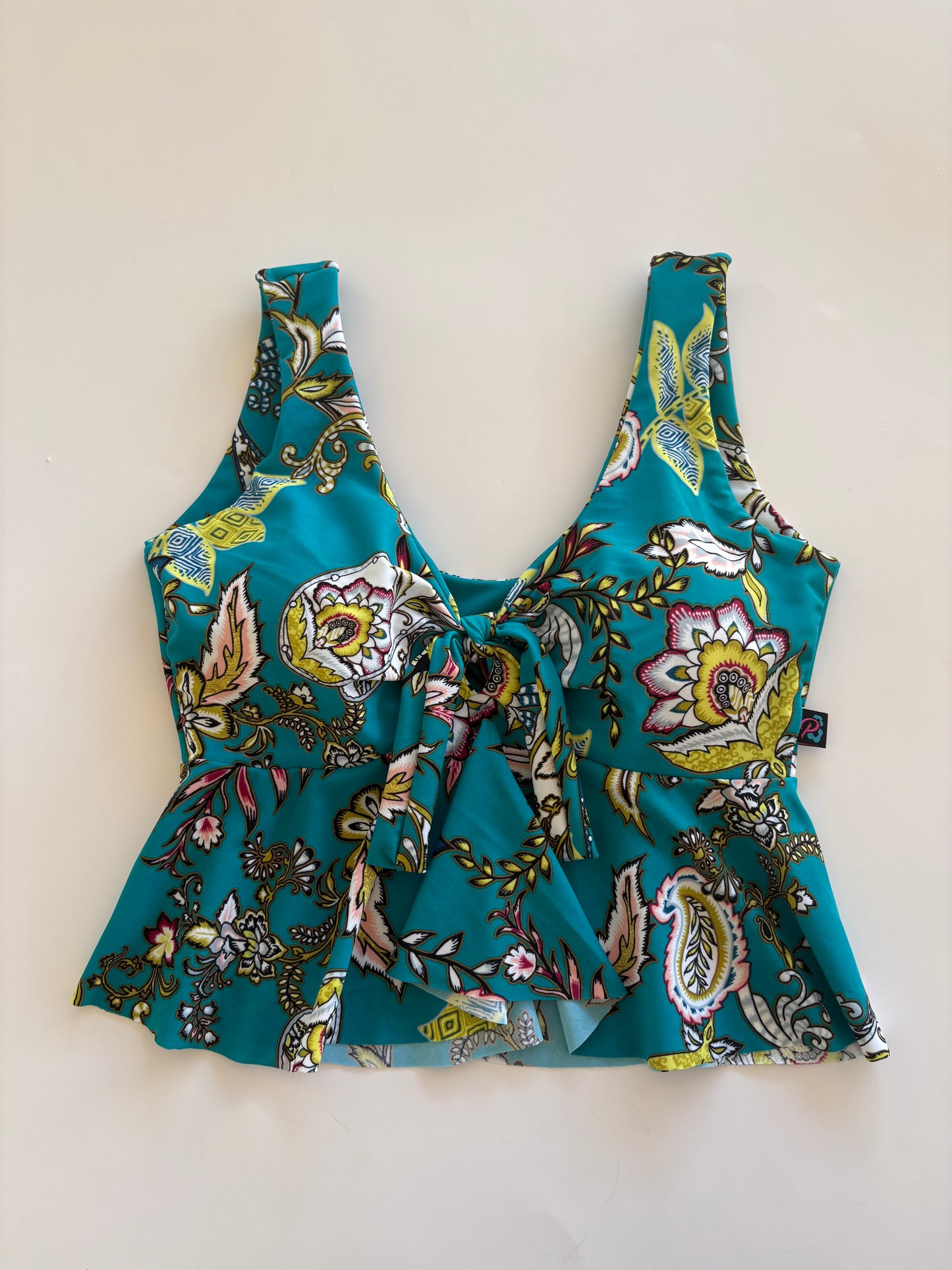 Top peplum estampado a elección